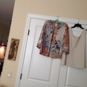 Asian print, very loose and flowy. Feels like silk